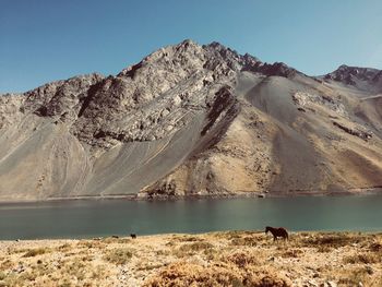 Scenic view of mountains against clear sky