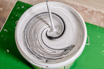 High angle view of ice cream in container on table