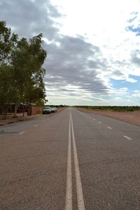 Surface level of empty road along landscape