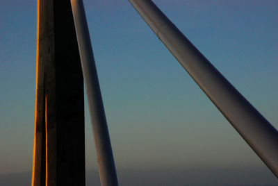 Low angle view of metallic structure against sky