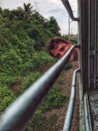 Portrait of man traveling in train