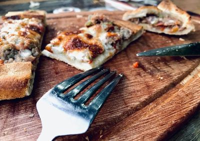 Close-up of pizza on cutting board