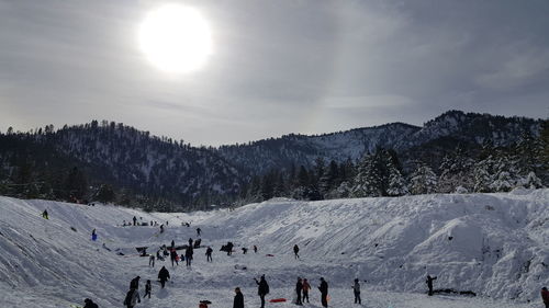 Scenic view of landscape against sky during winter