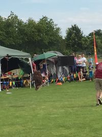 Low angle view of people playing football