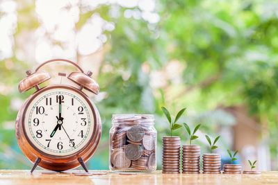 Close-up of clock on table