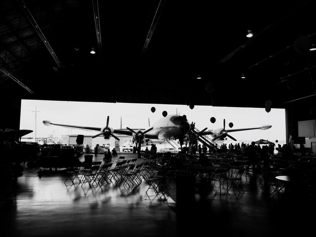 REFLECTION OF AIRPLANE IN AIRPORT