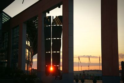 Built structure against sky at sunset