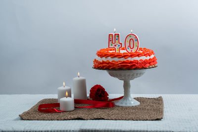 Close-up of birthday cake on table