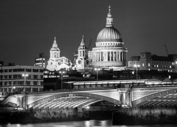 Illuminated church against sky at night
