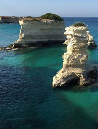 Scenic view of sea against blue sky