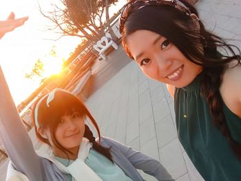 Portrait of smiling girl with mother