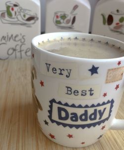 Close-up of coffee cup on table