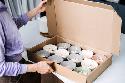 Midsection of man holding food