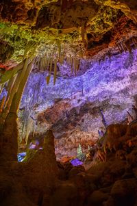 Low angle view of illuminated cave