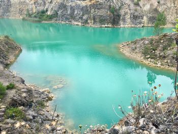 High angle view of rock formation in lake