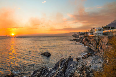 Scenic view of sea against sky during sunset