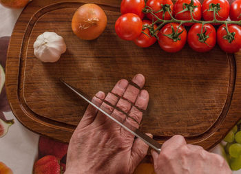 High angle view of person preparing food on table