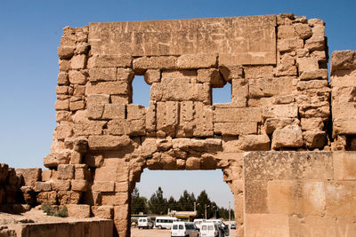 Low angle view of old ruins against sky