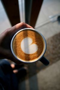 High angle view of coffee cup on table