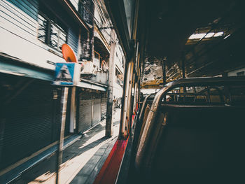 Road amidst buildings in city