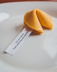 Close-up of food with text on table