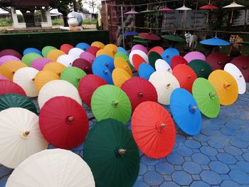 Colorful umbrellas on floor