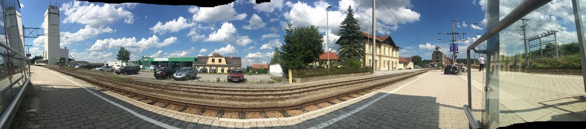 Panoramic view of railroad tracks against sky