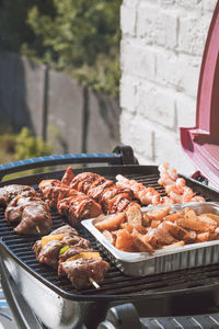 Close-up of meat on barbecue grill