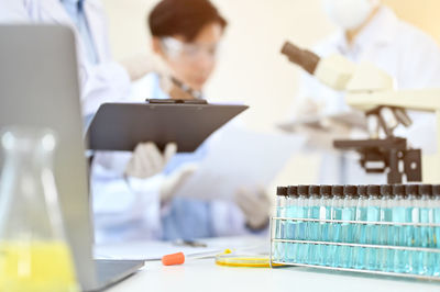 Doctor examining chemical in laboratory