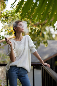 Young woman using mobile phone