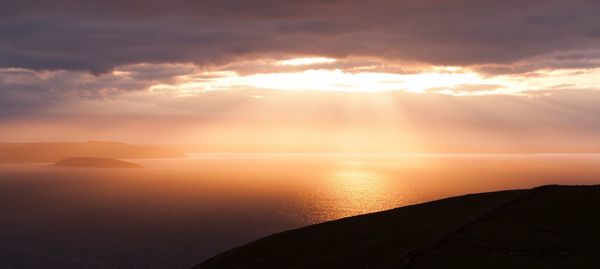 Scenic view of sea at sunset