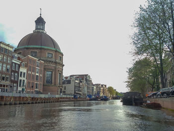 View of cathedral in city against clear sky