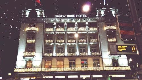 Low angle view of illuminated building at night