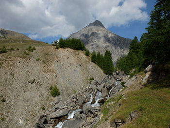 Scenic view of rocky mountains against sky