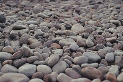 Full frame shot of pebbles on beach