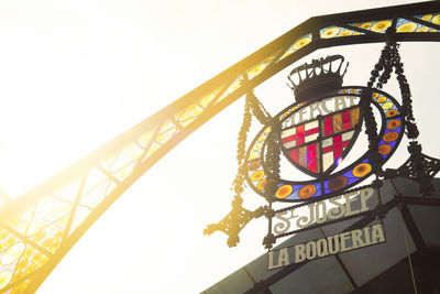 Low angle view of clock tower against sky