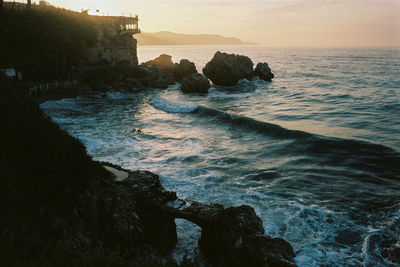 Scenic view of sea against sky during sunset