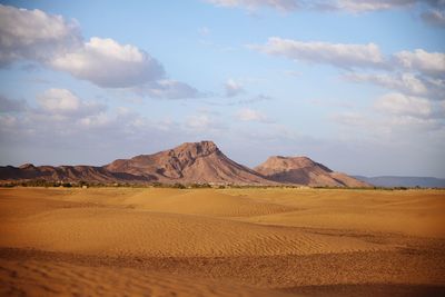 Scenic view of desert against sky