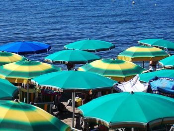 Multi colored umbrellas on beach