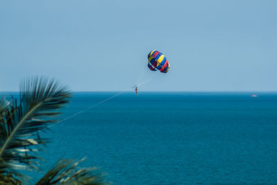 Scenic view of sea against blue sky