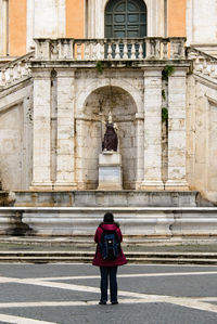 Full length of a man standing in historical building