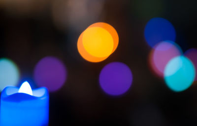 Defocused image of illuminated lights at night