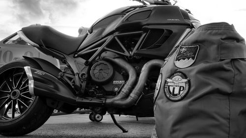 Close-up of motorcycle against the sky