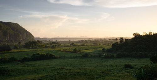 Scenic view of landscape against sky during sunset