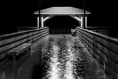 Bridge over lake at night