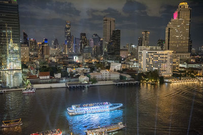 Illuminated buildings in city at night