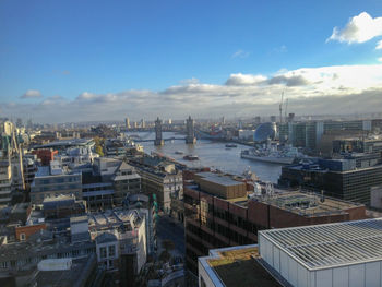 High angle view of buildings in city against sky