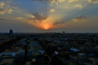 High angle view of townscape against sky at sunset