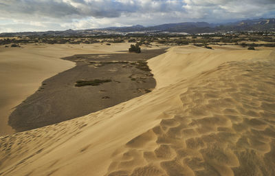 Scenic view of desert against sky