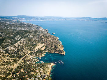 High angle view of bay against sky